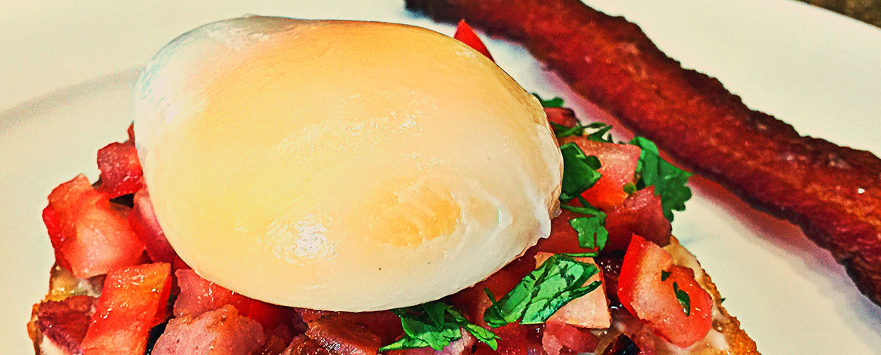 Sous vide eggs served close up